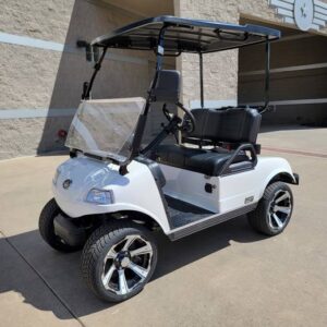 White 2 seaters lithium evolution golf cart