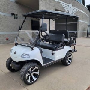 White 4 seaters lithium evolution golf cart